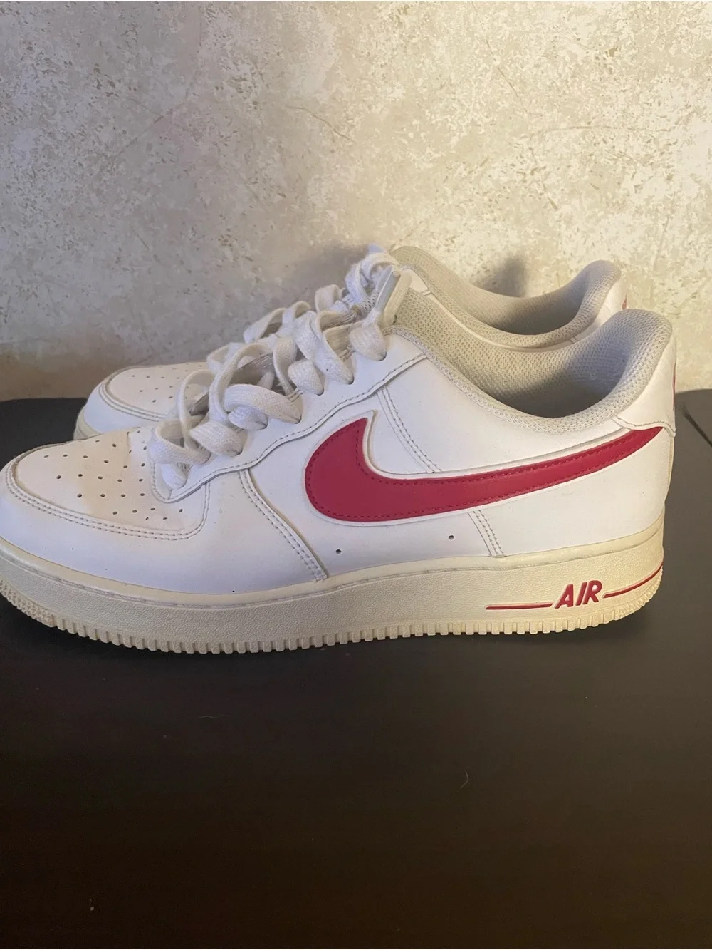 Nike Air Force 1 All-White Low Top Sneakers with Red Swoosh